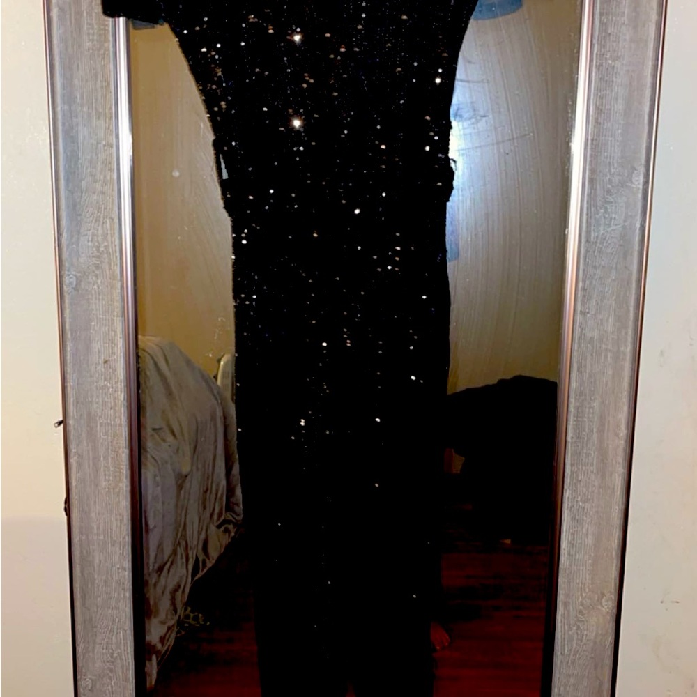 All black jumper with sequence. Size large
